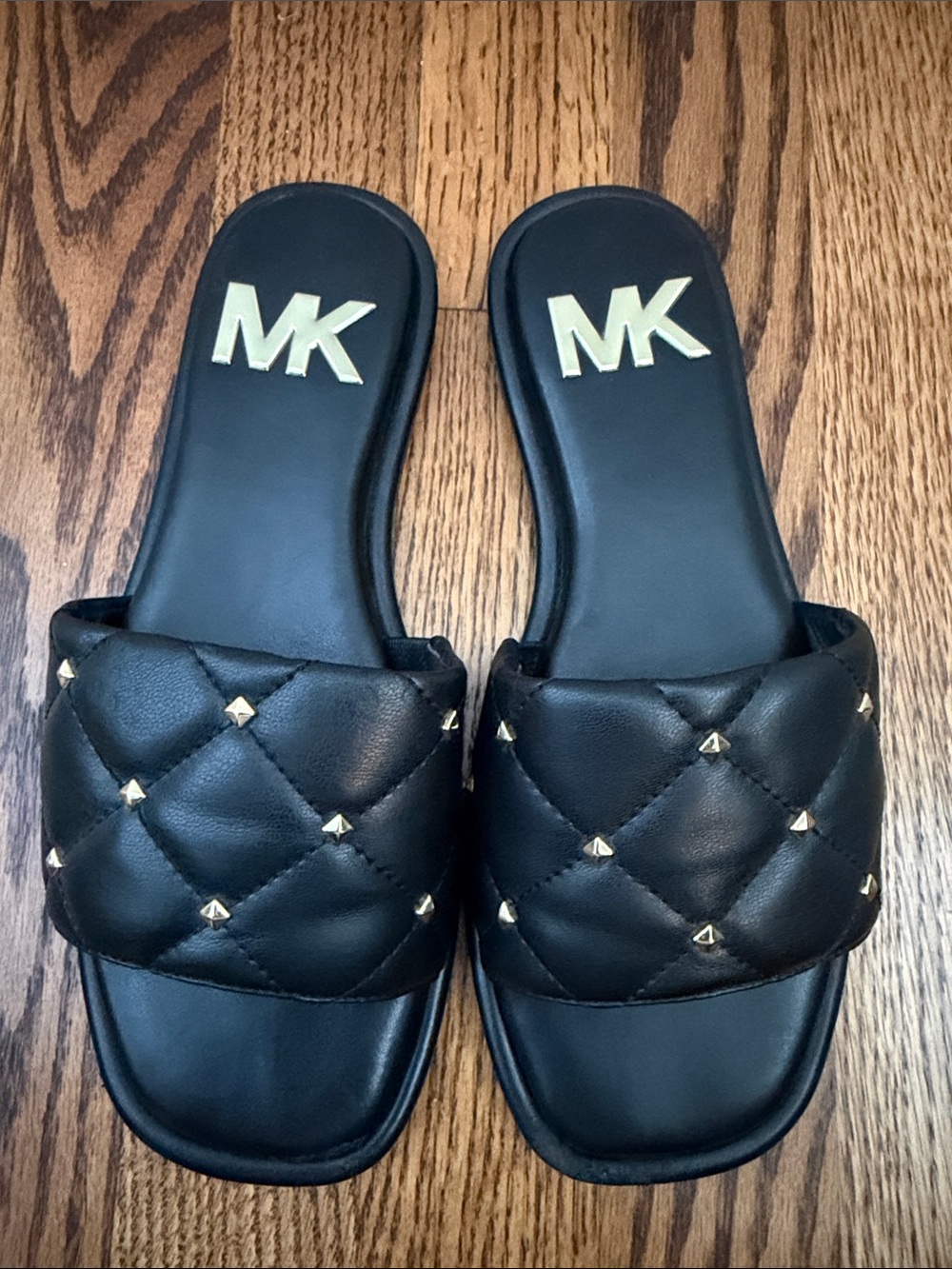 Michael Kors Black Quilted Slide Mules with Gold MK Logo